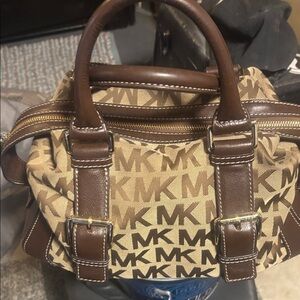 Tan & Brown with gold buckles & zipper leather handles